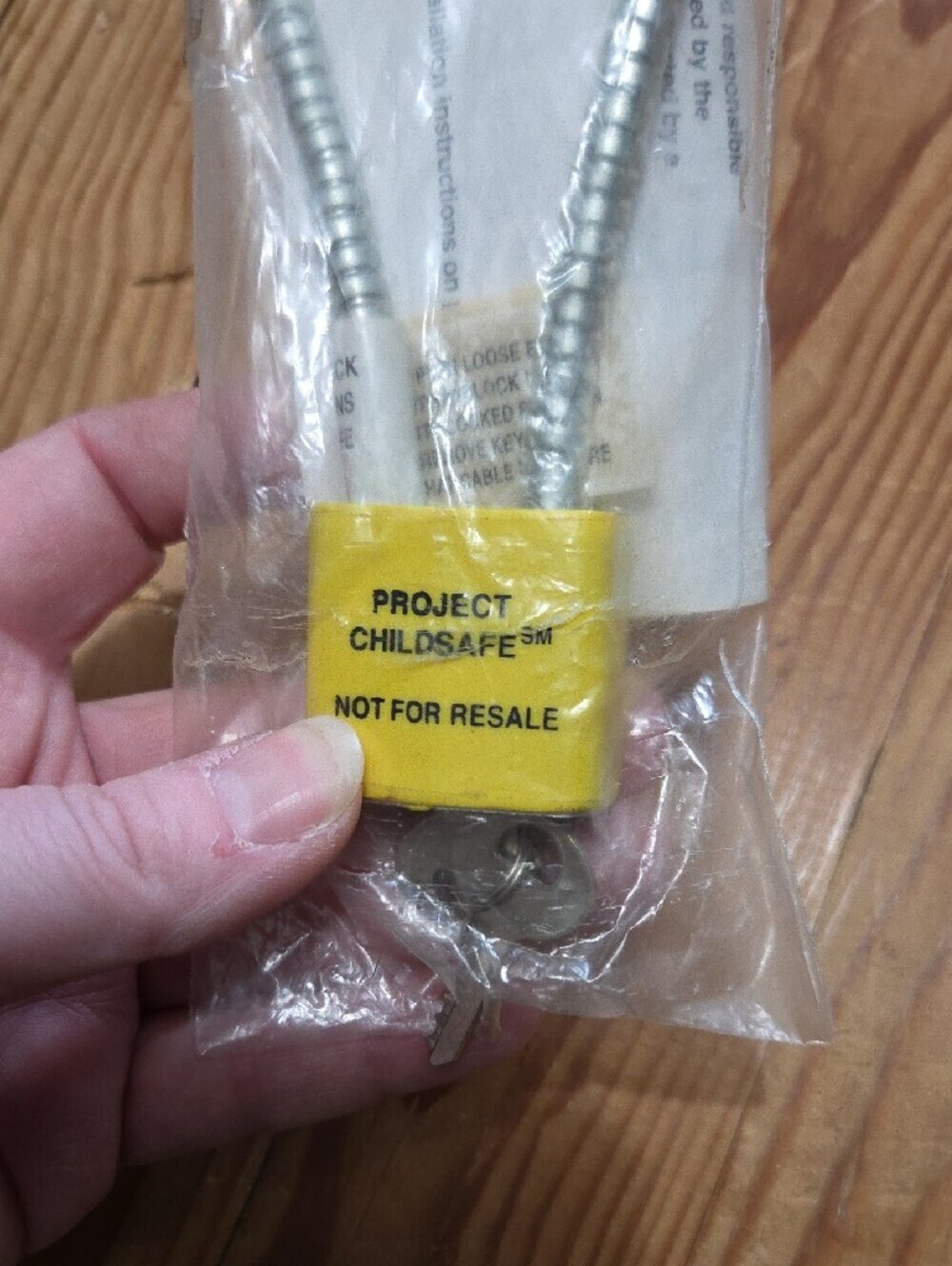 Project Safechild Flexible Metal Conduit with Yellow Safety Tag Gun Safety - Picture 2 of 3